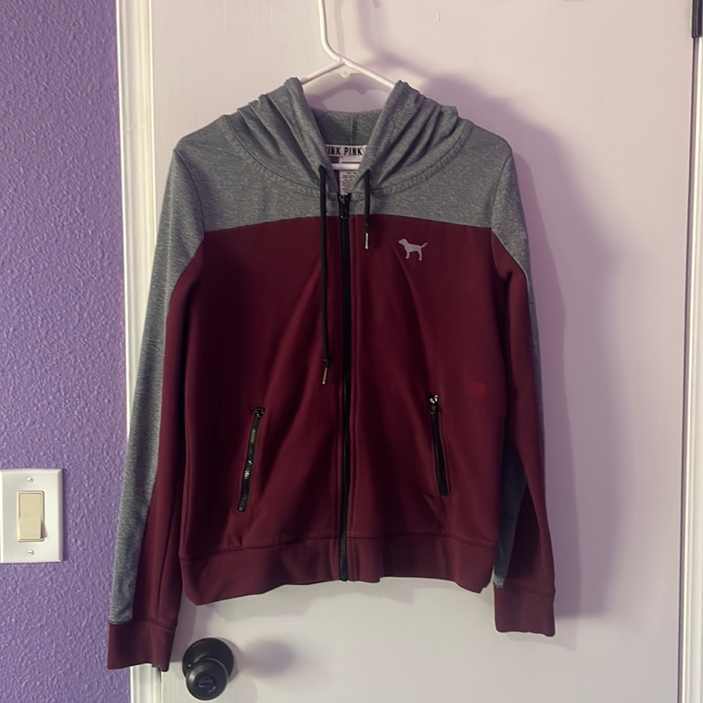 great condition, burgundy and grey PINK zip up with zipper pockets! size M
